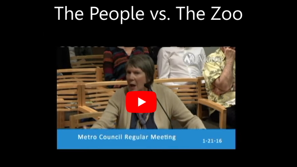 Public testimony at a Portland Metro Council hearing showing a citizen passionately speaking at the microphone during the Oregon Zoo bond measure controversy.
