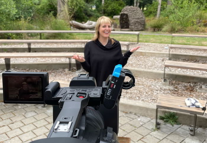 Debbie Ethell filming a segment for her elephant series with the camera in the foreground.